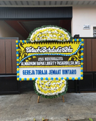 Papan Bunga Duka di Mazo